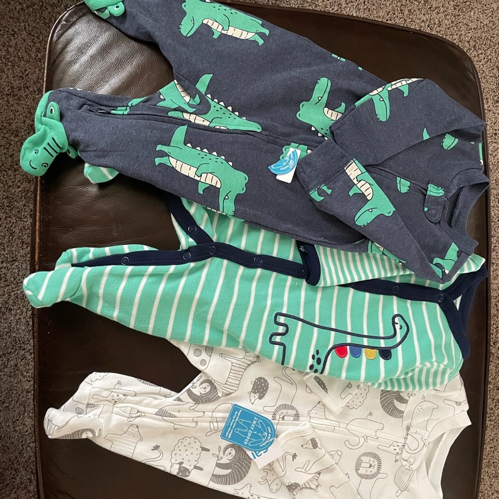 New set of 3 infant footed sleepers. Newborn, 0-3m